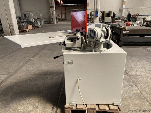 Double tilting vertical cutting machine  