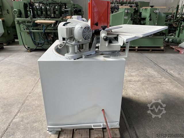 Double tilting vertical cutting machine  