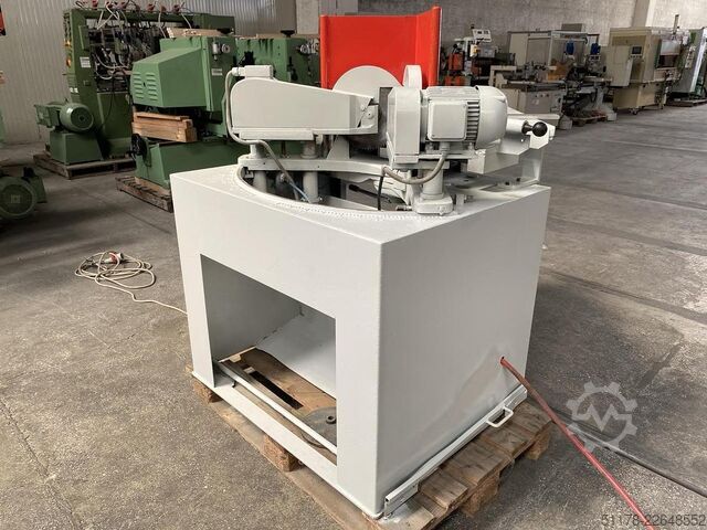 Double tilting vertical cutting machine  