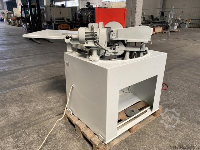 Double tilting vertical cutting machine  