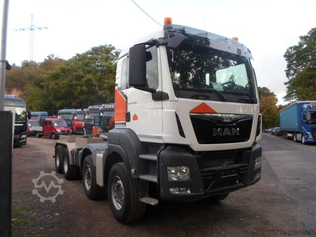 Roll-off tipper truck MAN TGS 41.480/8x4/Abroller HIAB KNICKARM