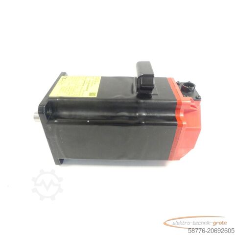Fanuc Motor Fanuc A06B-0064-B203 # 0100 AC Servo Motor SN: C157F0F9D + Pulsecoder ungebr.