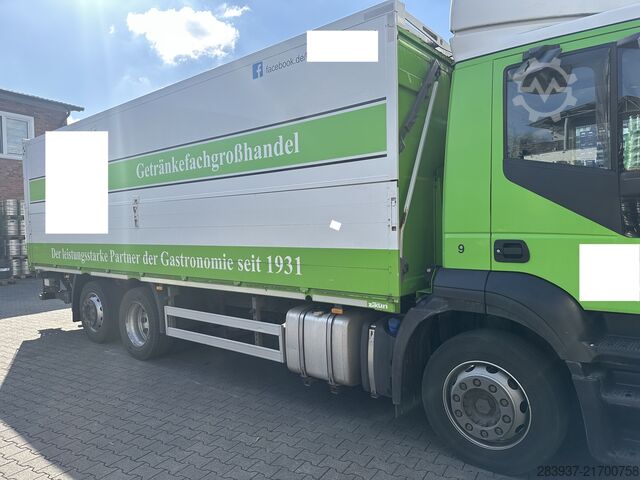 Flatbed truck with tarp IVECO Stralis AT