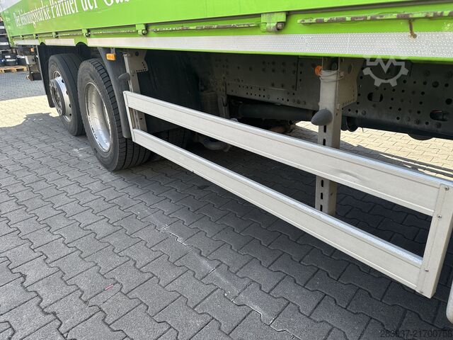 Flatbed truck with tarp IVECO Stralis AT