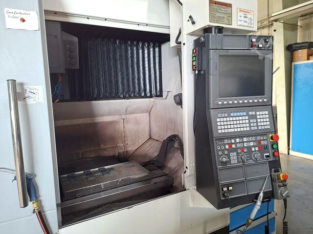 Vertical machining center Okuma Genos M460-VE-e