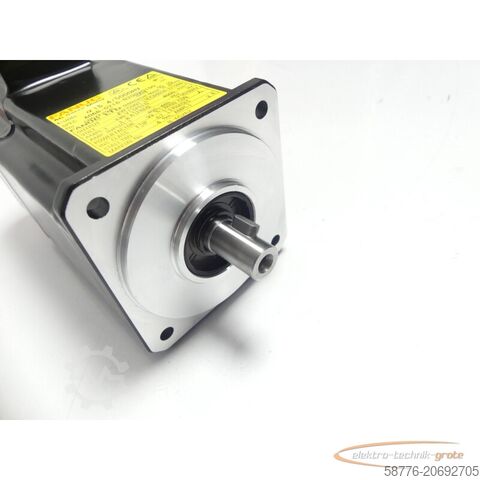Fanuc Motor Fanuc A06B-0216-B200 # 0100 Motor SNC05XF2945 + A860-2000-T321 --