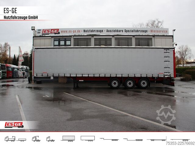 Open semitrailer with tarp KÖGEL 3-Achs-Cargo-Coil-Pritschensattelanhänger