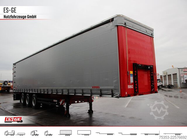 Open semitrailer with tarp KÖGEL 3-Achs-Cargo-Coil-Pritschensattelanhänger