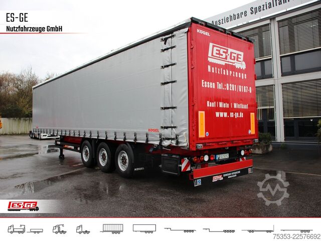 Open semitrailer with tarp KÖGEL 3-Achs-Cargo-Coil-Pritschensattelanhänger