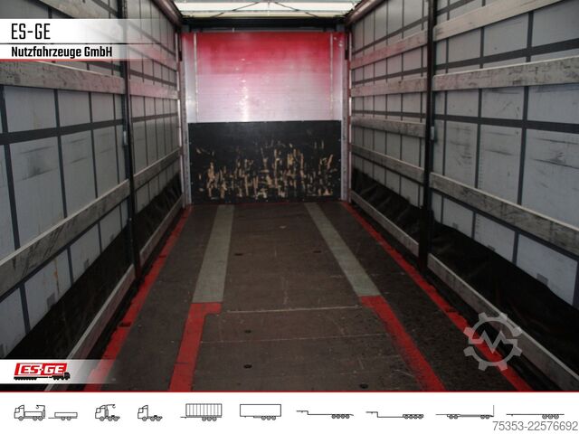 Open semitrailer with tarp KÖGEL 3-Achs-Cargo-Coil-Pritschensattelanhänger