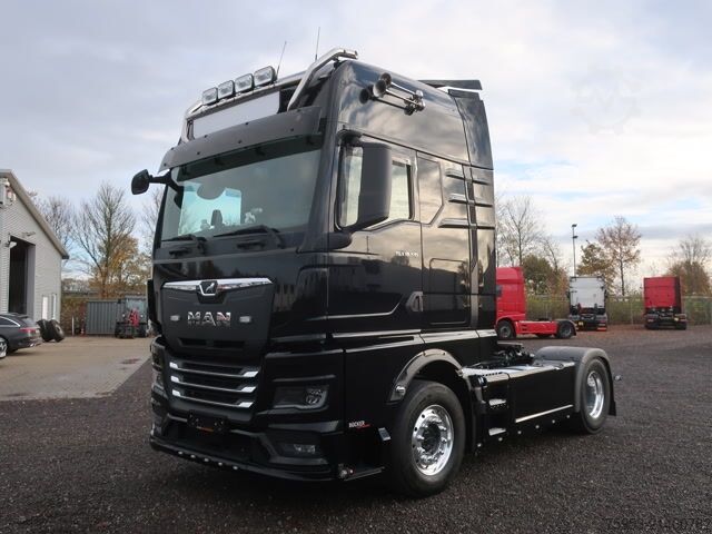 Standard tractor unit MAN 18.510 TGX HX Kabine Intarder Standklima Alcoa
