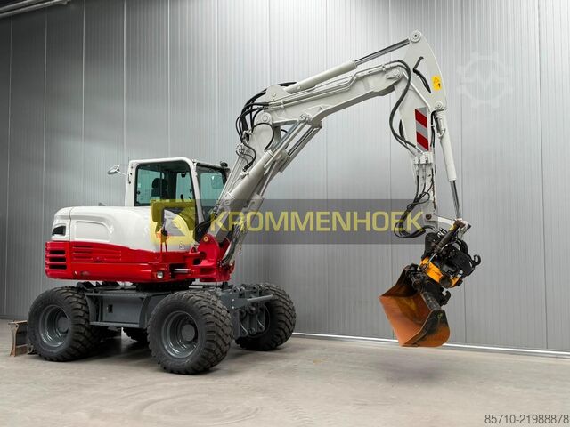 Wheel excavator Takeuchi TB 295 W Engcon Draaikantelstuk