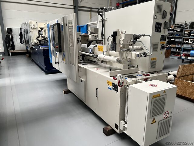 Injection moulding machine Krauss Maffei KM 50 - 180 CX