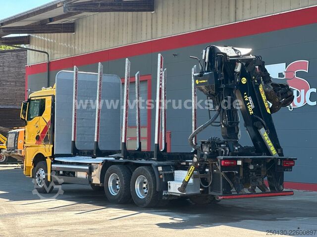 Holztransporter LKW MAN TGX 33.580 6x4 BL PAVIC Holz & TAJFUN 130ZK