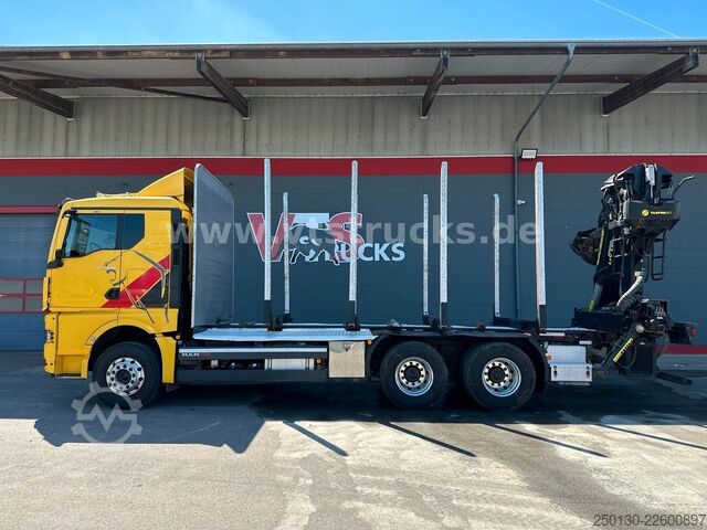 Holztransporter LKW MAN TGX 33.580 6x4 BL PAVIC Holz & TAJFUN 130ZK