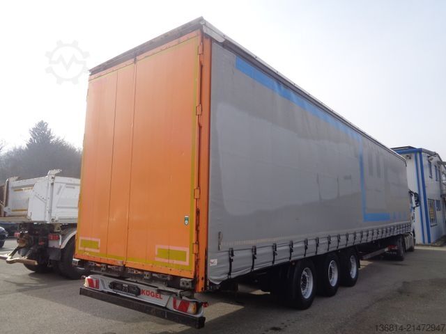 Auflieger mit Pritsche & Plane KÖGEL SN24 MEGA 435/50 R19,5 SAF