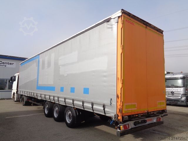 Auflieger mit Pritsche & Plane KÖGEL SN24 MEGA 435/50 R19,5 SAF