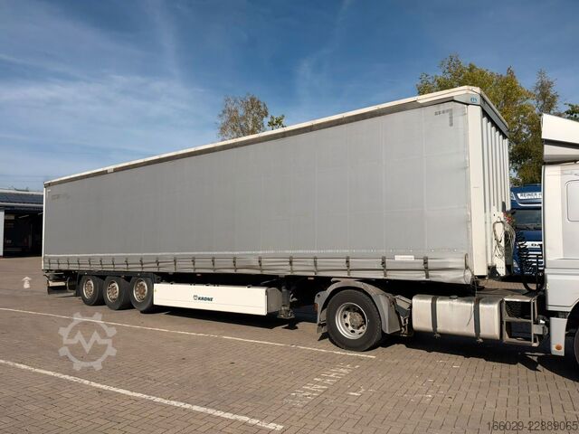 Open semitrailer with tarp KRONE Schiebeplanen Auflieger mit Liftachse
