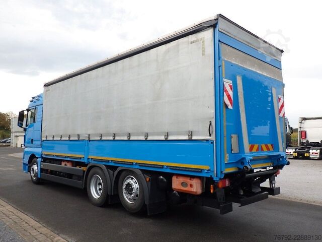 Flatbed truck MAN TGX 26.460 LL L-Fhs./Pritsche/LBW/Lenkachse/Ret.