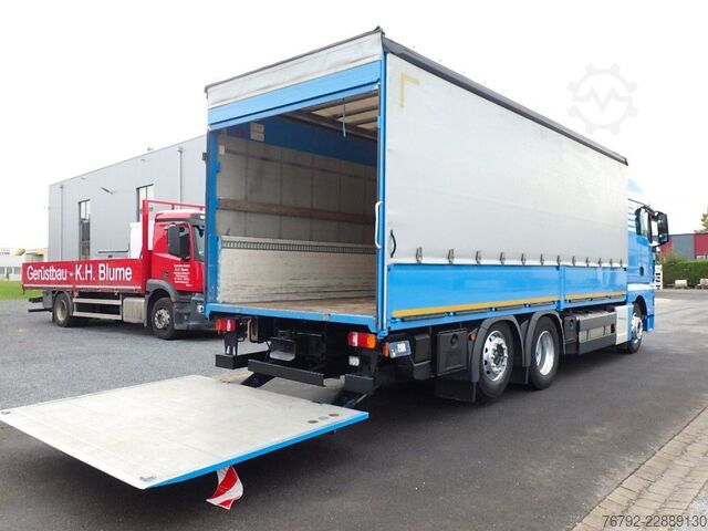 Flatbed truck MAN TGX 26.460 LL L-Fhs./Pritsche/LBW/Lenkachse/Ret.
