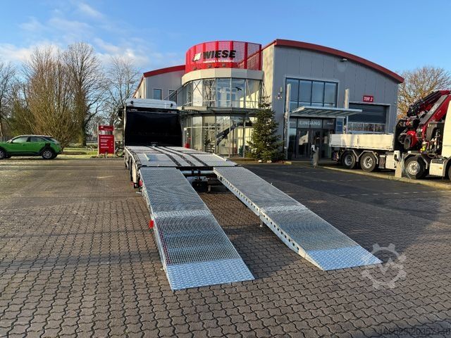 Car carrier truck MAN Baumaschinen-  Arbeitsbühnentransporter Rampen