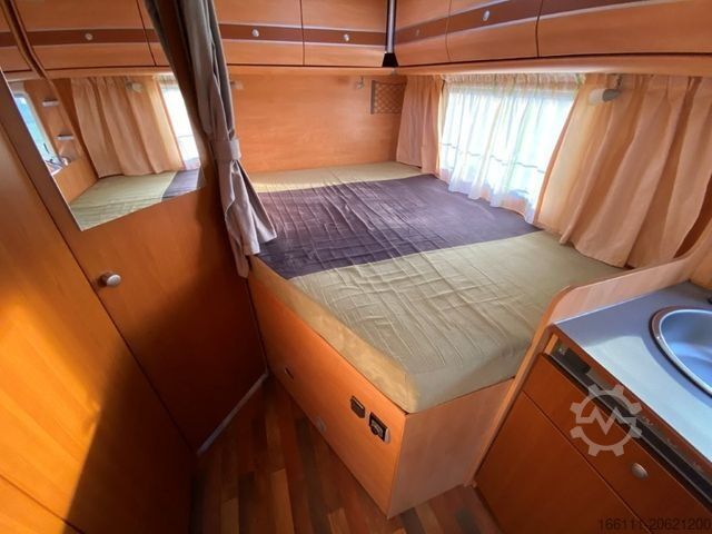 Semi-integrated camper GLUECKSMOBIL T 345 - Festbett - Klima - Sat/TV - Solar -