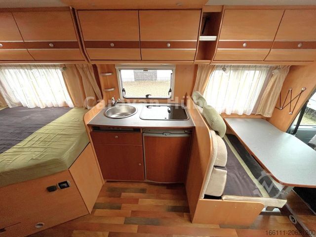 Semi-integrated camper GLUECKSMOBIL T 345 - Festbett - Klima - Sat/TV - Solar -
