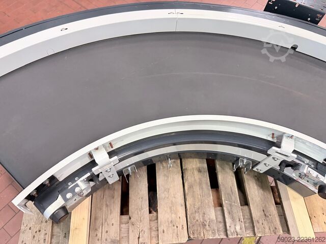 Conveyor belt curve, belt, 90 degrees with drive. Vanderlande Gurtkurvenförderer