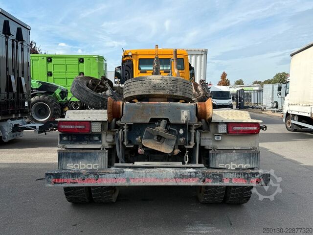 Abrollkipper MAN TGS 37.500 8x4BB Abroller *Unfall* Retarder/Navi