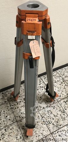 Tripod for placing a leveling device