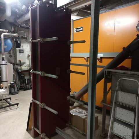 2 wood chip boilers, 300 kW and 550 kW Schmid AG UTSK-550.22 und UTSK-300.22