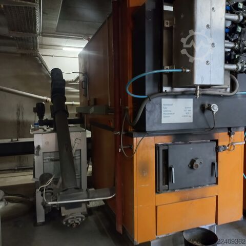 2 wood chip boilers, 300 kW and 550 kW Schmid AG UTSK-550.22 und UTSK-300.22