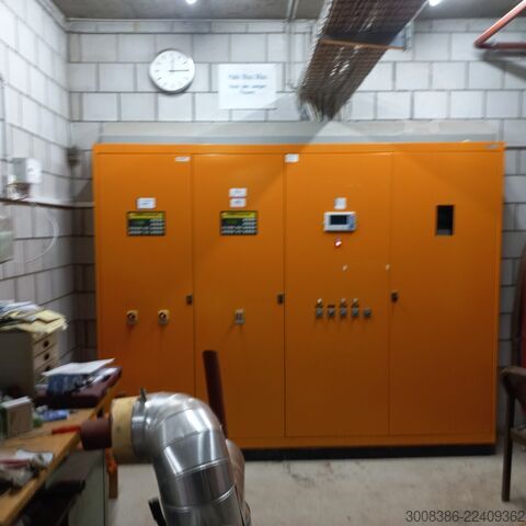 2 wood chip boilers, 300 kW and 550 kW Schmid AG UTSK-550.22 und UTSK-300.22