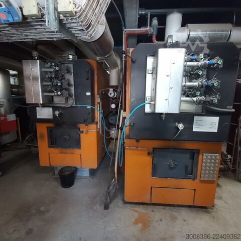 2 wood chip boilers, 300 kW and 550 kW Schmid AG UTSK-550.22 und UTSK-300.22