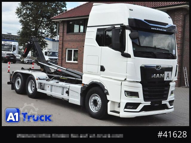 Roll-off tipper truck MAN TGX 26,500 LL, HIAB Intarder Navi Sound, Funk