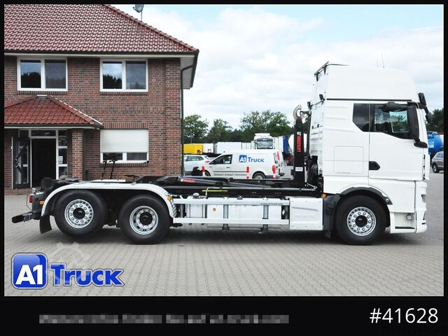 Roll-off tipper truck MAN TGX 26,500 LL, HIAB Intarder Navi Sound, Funk