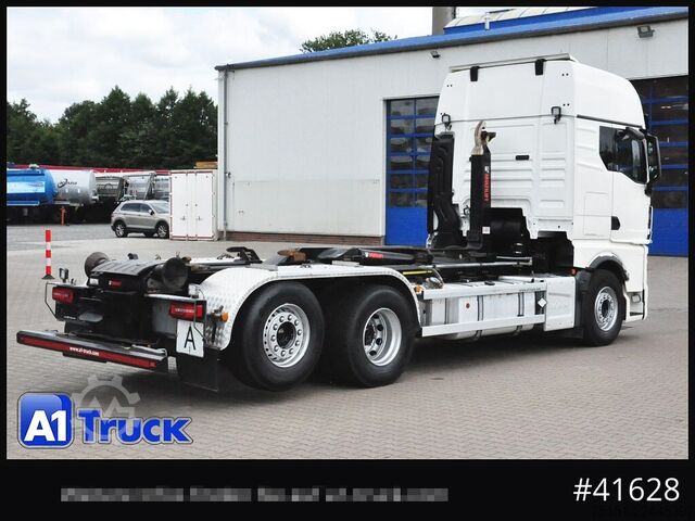 Roll-off tipper truck MAN TGX 26,500 LL, HIAB Intarder Navi Sound, Funk
