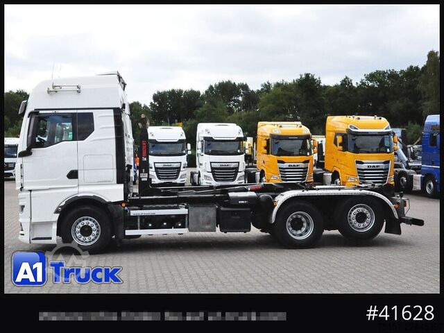 Roll-off tipper truck MAN TGX 26,500 LL, HIAB Intarder Navi Sound, Funk