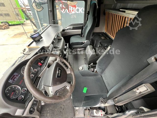 Roll-off tipper truck MAN TGX 26.400 6x2 HIAB Abroller
