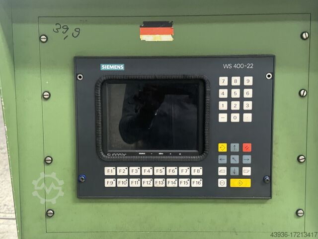 Punching machine Andritz Kaiser KSTU MB 1250