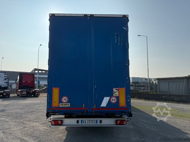 Truck with flatbed and tarpaulin Mercedes-Benz actros 2551
