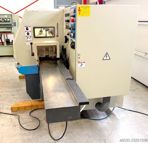 Vierseitenhobelmaschine WEINIG Unimat 23 E