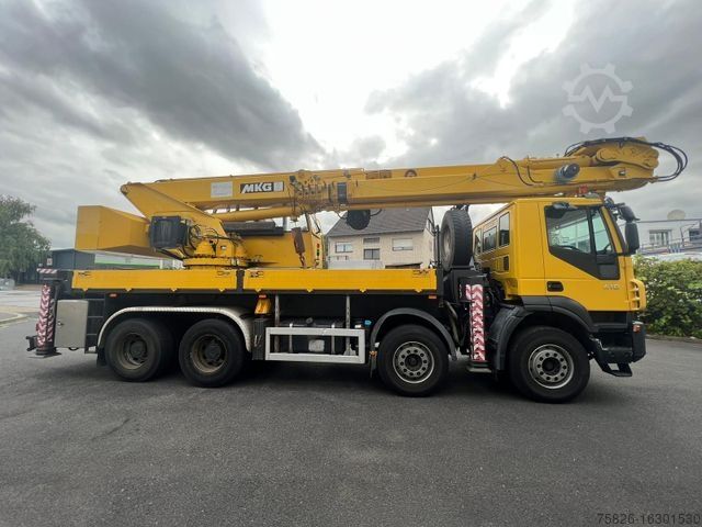Truck mounted crane IVECO Trakker 410 Dachdecker 36m MKG HMK 851 TA A2A2