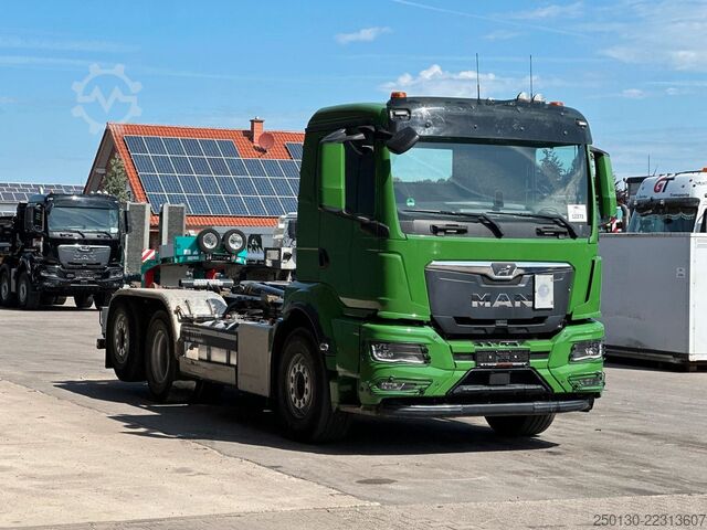 Roll-off tipper truck MAN TGS 26.520 6x2 BL MEIILLER RS21.60 AK
