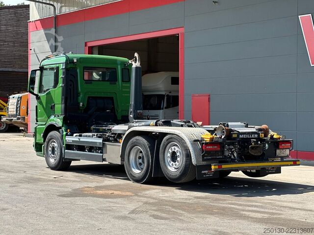 Roll-off tipper truck MAN TGS 26.520 6x2 BL MEIILLER RS21.60 AK