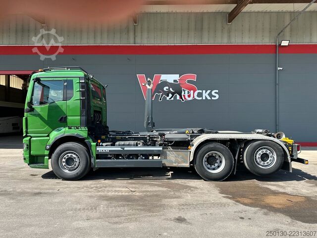 Roll-off tipper truck MAN TGS 26.520 6x2 BL MEIILLER RS21.60 AK