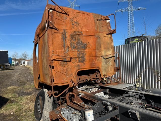 Flatbed truck with tarp RENAULT D WIDE 280 E6 Brandschaden