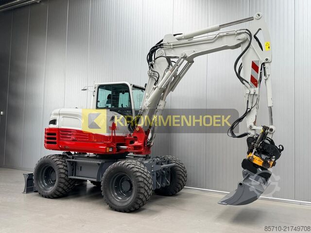 Radbagger Takeuchi TB 295 W Engcon Draaikantelstuk