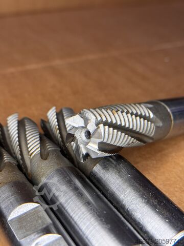 4 roughing cutters, 9 end mills HSS new Ø 25