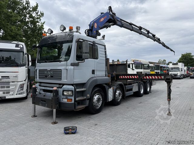 Flatbed truck MAN TGA 35.400 8X4 Kran PM 48028 bis 26 Meter